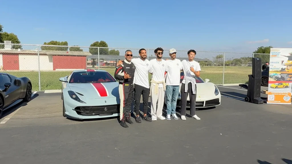 Gotham Motorsports team and young guests with the race car